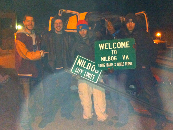 Nilbog,VA plan 9 cast holding signs